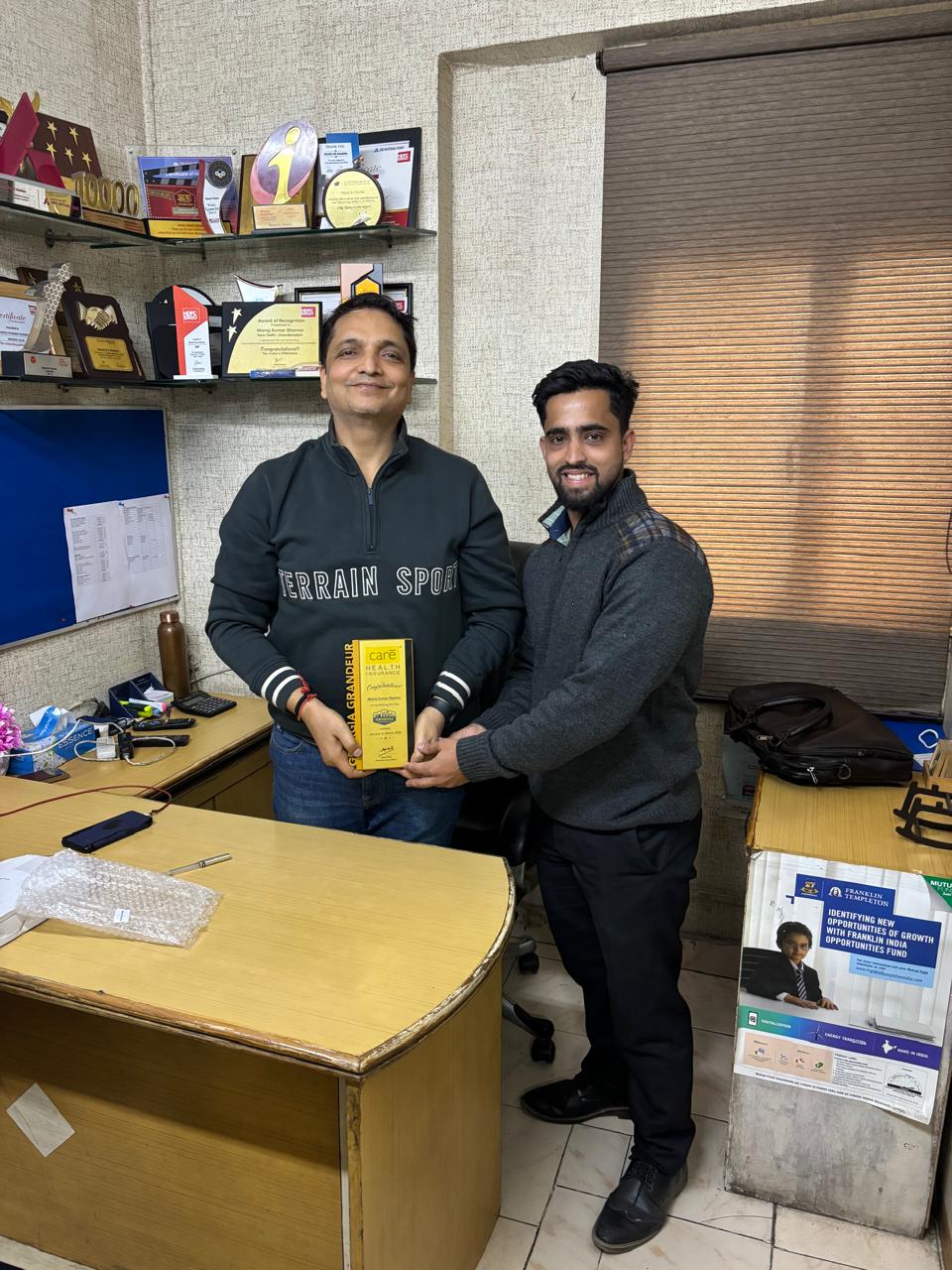 GampInsure advisor at the Connaught Place office